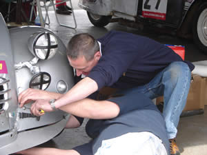 Richard Dalton assists with repairs